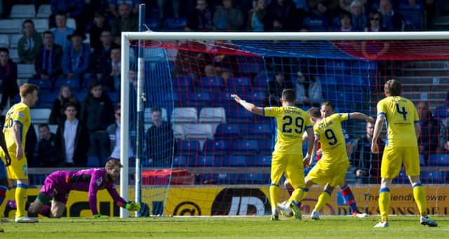 Steven MacLean puts Saints in front in Inverness. Pic: SNS/Sammy Turner