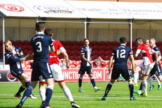 Massimo Donati puts Hamilton in front against Ross County. SNS/