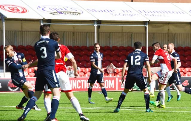 Massimo Donati puts Hamilton in front against Ross County. SNS/