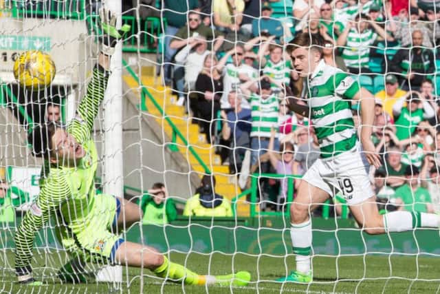 James Forrest heads home Celtics third goal to cement another victory for the champions. Photograph:  PA