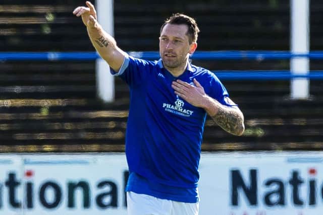 Stephen Dobbie (11) celebrates after he scores his side's second goal. Picture: Paul Devlin/SNS