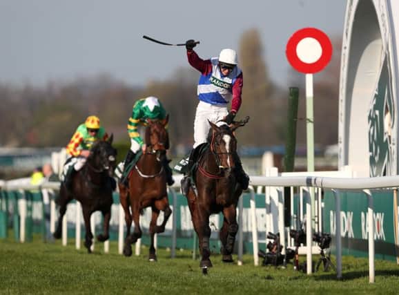 One For Arthur ridden by Derek Fox wins the Grand National at Aintree. Pic: Davies/PA Wire