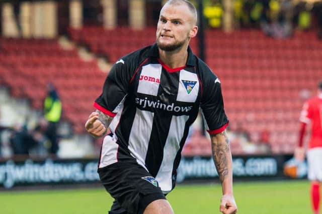 Kallum Higginbotham scored from the spot. Picture: Ross Parker/SNS
