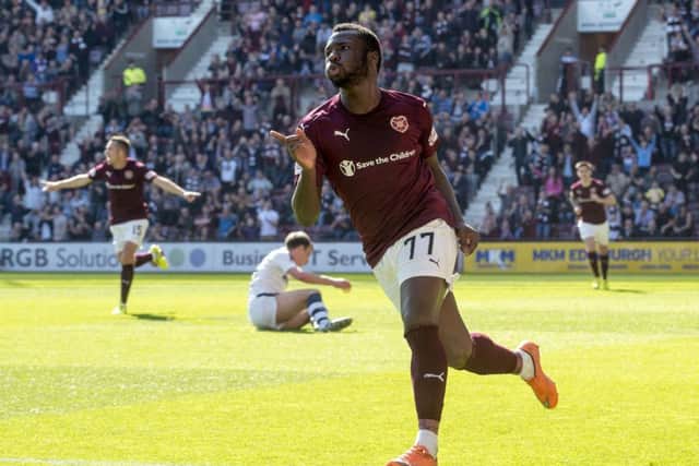 Esmael Goncalves retained composure to shot past Scott Bain to score the only goal of the game. Pic: Bill Murray/SNS