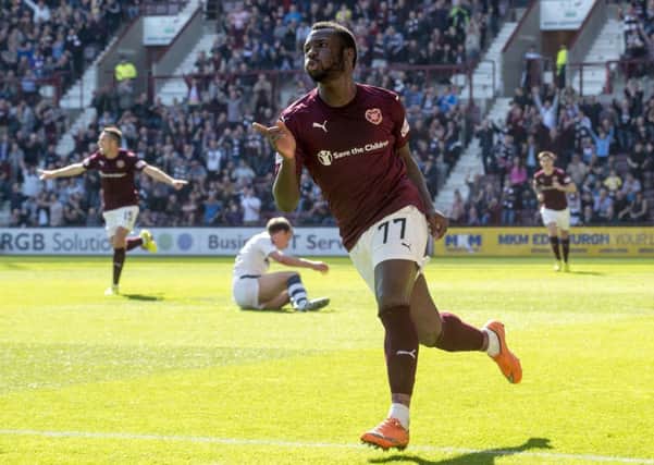 Esmael Goncalves retained composure to shot past Scott Bain to score the only goal of the game. Pic: Bill Murray/SNS