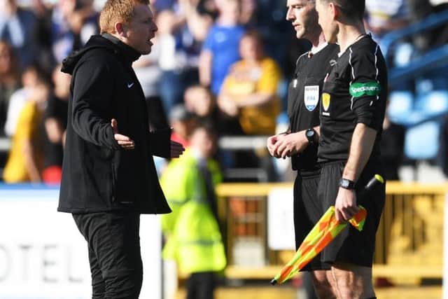 Neil Lennon complains to referee Bobby Madden at full time. Pic: SNS/Craig Williamson