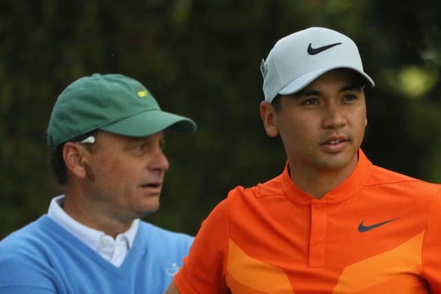 Jason Day was relieved to outscore Augusta National member Jeff Knox, left, who acted as the noncompeting marker for the world No.3. Picture: Andrew Redington/Getty