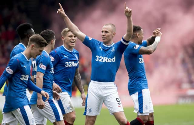 Kenny Miller celebrates after putting Rangers in front. Picture: SNS
