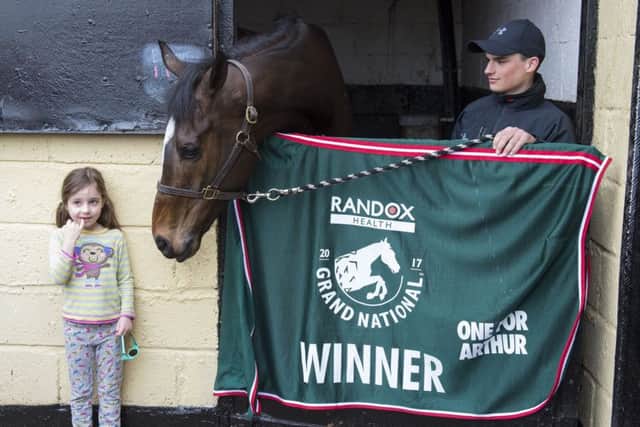 Hundreds of people turned up yesterday to greet Grand National hero One for Arthur. Picture: PA.