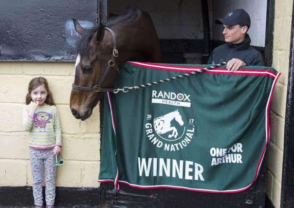 Hundreds of people turned up yesterday to greet Grand National hero One for Arthur. Picture: PA.