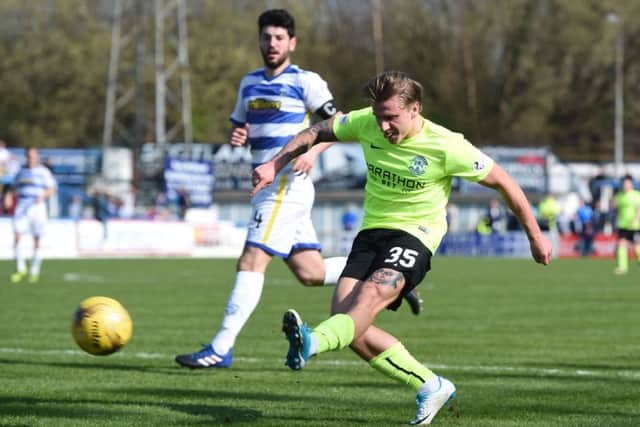 Jason Cummings fires Hibs aheadat Cappielow on Saturday. Picture: SNS