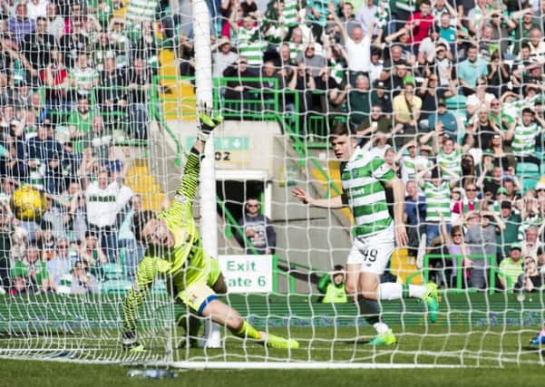 James Forrest scores his first headed goal in senior football to put Celtic 3-1 ahead. Picture: SNS.