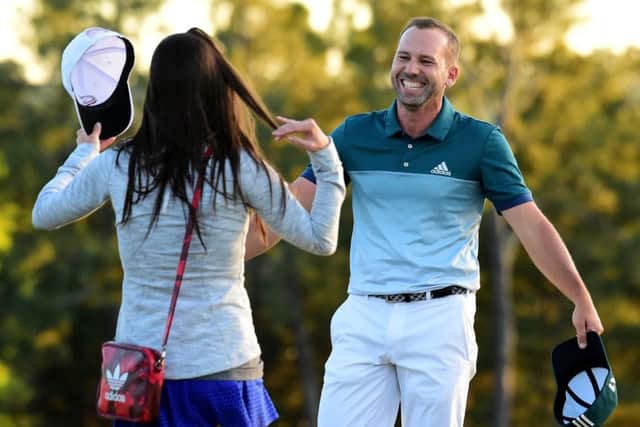 Sergio Garcia is greeted by fiancee Angela Akins after making his long-awaited major breakthrough in the 81st Masters. Picture: Getty Images