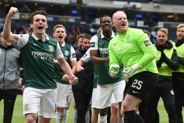 Conrad Logan celebrates with  John McGinn, left, after last years Scottish Cup final. Picture: SNS.