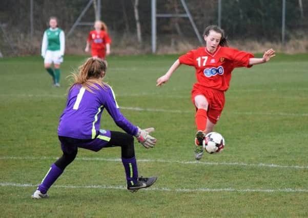 Hannah Scott scores for Scottish Schools Under-15s during their 7-1 victory over Hibs Under-17s.