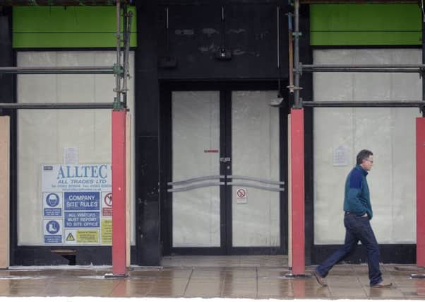 One in 11 shops lies vacant but councils could make a difference. Picture: Neil Hanna