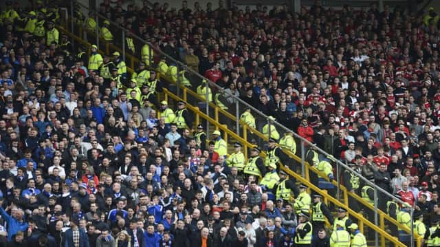 Five men were charged over alleged incidents at the game at Pittodrie (Photo: SNS)