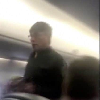 An image from a video shows the passenger who was removed from the United flight in Chicago. Picture: Contributed