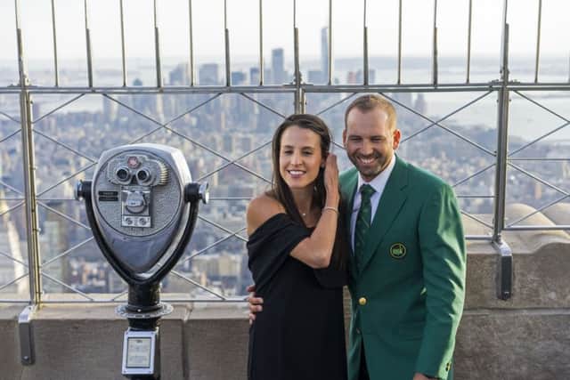 Masters winner Sergio Garcia, with his fiancee Angela Akins, stands on the 86th floor of the Empire State Building in New York. Picture: Craig Ruttle/AP