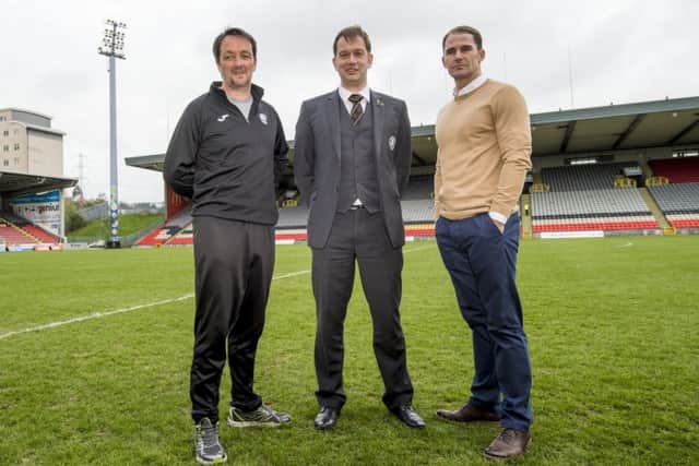 Partick Thistle manager Alan Archibald (right) joins Managing Director Ian Maxwell (centre) and Thistle Weir Youth Academy Director Gerry Britton as the club announce they will have their own dedicated training ground. Picture: SNS