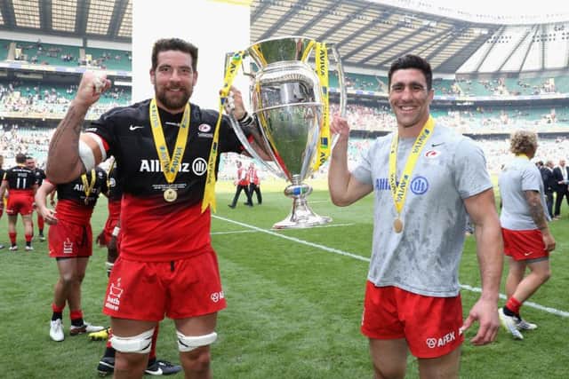 Kelly Brown, right, celebrates with team-mate Jim Hamilton after Saracens' Aviva Premiership final win over Exeter Chiefs at Twickenham last year. Picture: David Rogers/Getty Images