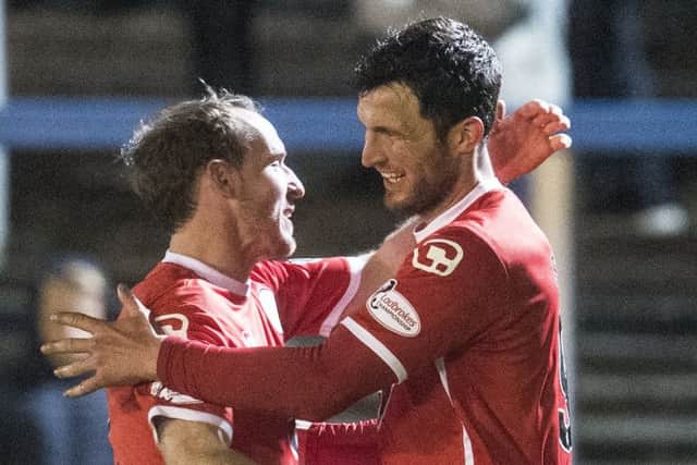 St Mirrens John Sutton, right, celebrates his goal against Dunfermline with Gary Irvine. Picture: SNS.