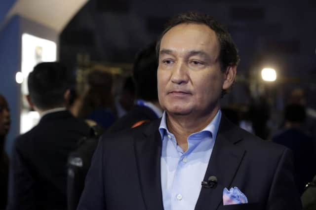 United Airlines CEO Oscar  Munoz said he was committed to "fix what's broken so this never happens again" (AP Photo/Richard Drew, File)