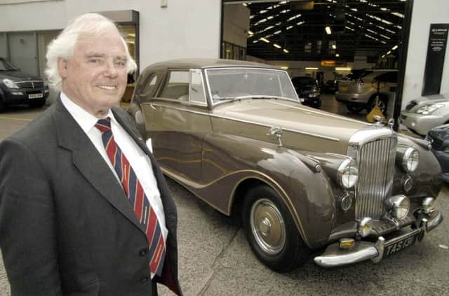 FILE PICTURE - dated October 18 2005. Sir Arnold with his 1948 Bently, Mark VI, Sedanca Coupe. Scottish car billionaire Sir Arnold Clark has died, aged 89. The billionaire was born in Glasgow, where he set up his first showroom in 1954 after leaving the RAF. A statement said he had passed away peacefully, "surrounded by his family". It added that Sir Arnold, who was knighted in 2004, was "an inspiration" and said "the family will continue to carry on his vision".