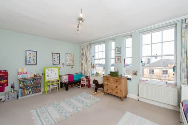 A spare bedroom is also used as a playroom