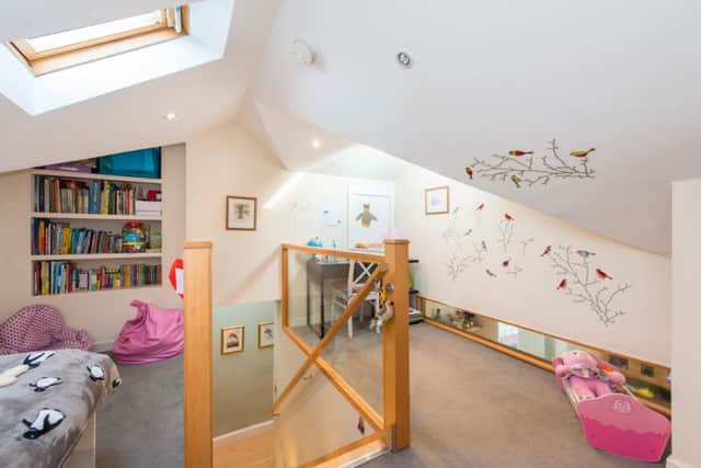 The kids' bedrooms are tucked away on the upper floor