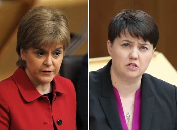 Ms Sturgeon has branded Ms Davidson "shameful" for her stance on the UK Government's so-called rape clause.  (Photo: PA Wire)