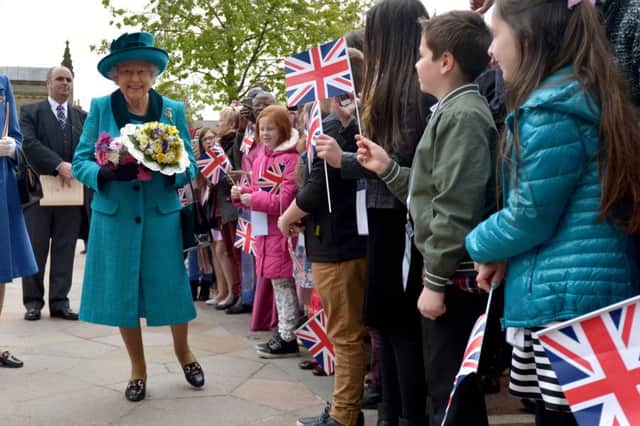 The Queen meets local children following the Royal Maundy service. (Photo: Anthony Devlin/PA Wire)
