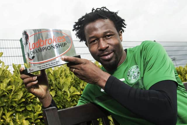 Efe Ambrose, named as the Championship Player of the Month, says Celtic manager Brendan Rodgers was a positive influence.