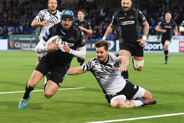 Glasgow Warriors' Peter Murchie scores a try against Zebre. Picture: Paul Devlin/SNS