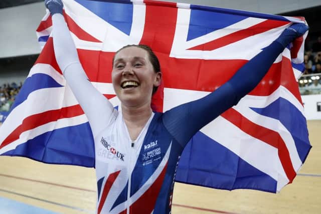 Great Britain's Katie Archibald celebrates after winning the gold medal in the women's omnium at the World Track Cycling championships in Hong Kong. Picture: Kin Cheung/AP