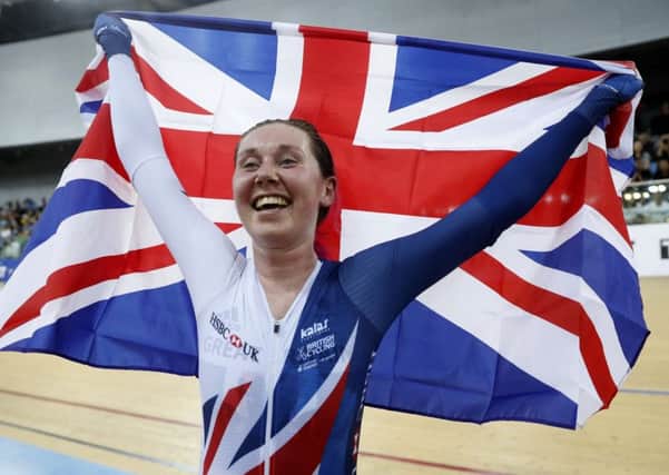 Great Britain's Katie Archibald celebrates after winning the gold medal in the women's omnium at the World Track Cycling championships in Hong Kong. Picture: Kin Cheung/AP