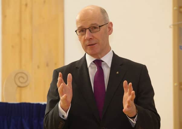 John Swinney plans to give greater control to headteachers. Picture: Scott Louden