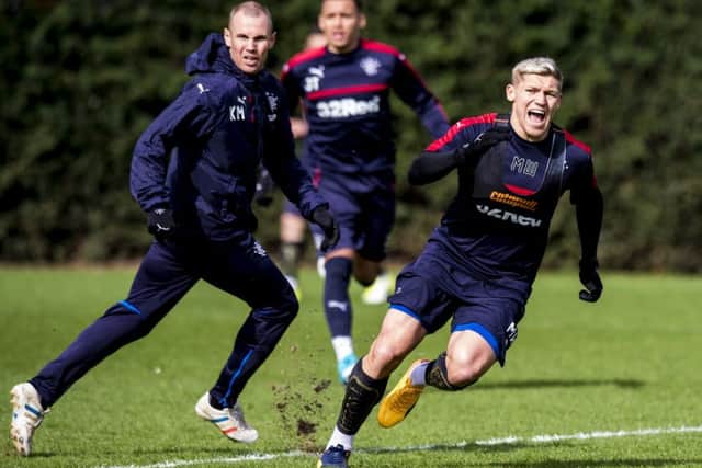 Rangers' Martyn Waghorn, right, has called on the club to give  Kenny Miller a new deal. Picture: Craig Williamson/SNS
