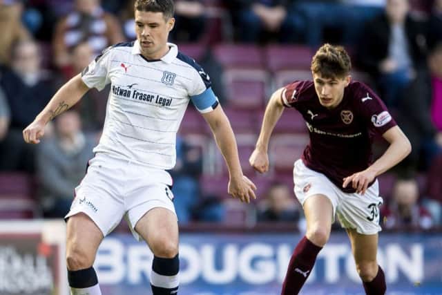 Dundee's Darren O'Dea, in action against Hearts, says there is no need to panic. Picture: Bill Murray/SNS
