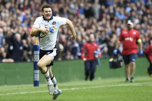 Duncan Taylor runs through to score Scotland's second try in last year's Six Nations match against France at BT Murrayfield. Picture Ian Rutherford