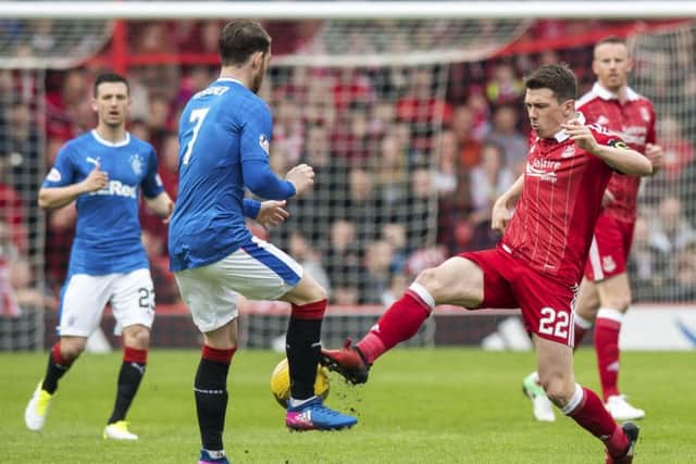 Aberdeen captain Ryan Jack, right, is likely to head to England when he does leave Pittodrie. Pic: SNS