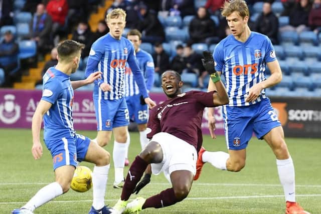 Hearts' Arnaud Djoum goes down in the box against Kilmarnock. Picture: Rob Casey/SNS