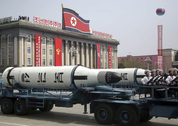A submarine-launched ballistic missile is displayed in Kim Il Sung Square during a military parade yesterday. (AP Photo/Wong Maye-E)