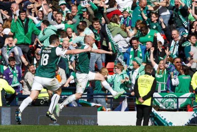 King David: Hibs David Gray jumps for joy after his dramatic cup final winner. Neil Lennon was working on TV in Dublin when the goal went in. Picture: Robert Perry