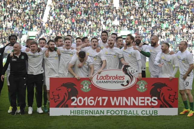 Hibs celebrate winning the Championship
. Pic: Neil Hanna