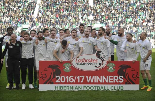 Hibs celebrate winning the Championship
. Pic: Neil Hanna