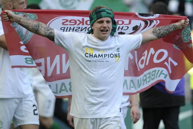 No flagging for Jason Cummings as he enjoys the celebrations after the title is secured at Easter Road. Picture: Neil Hanna
