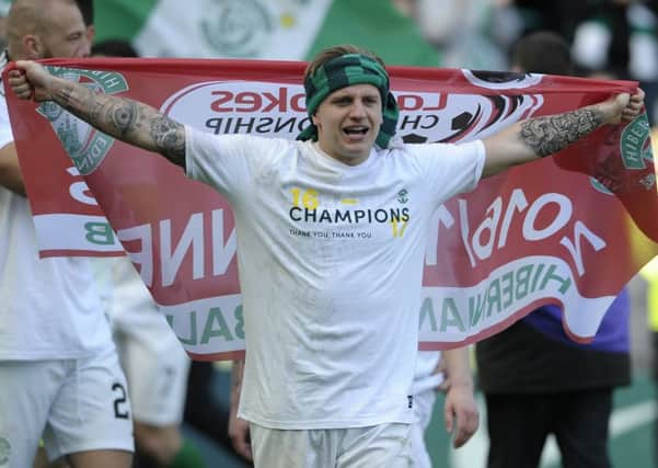 No flagging for Jason Cummings as he enjoys the celebrations after the title is secured at Easter Road. Picture: Neil Hanna
