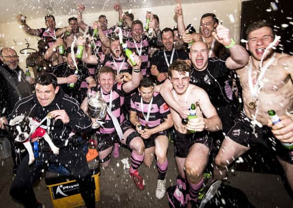 The Ayr team celebrate their 12-8 win over Melrose which clinched the BT Premiership title. Picture: Gary Hutchison/SNS