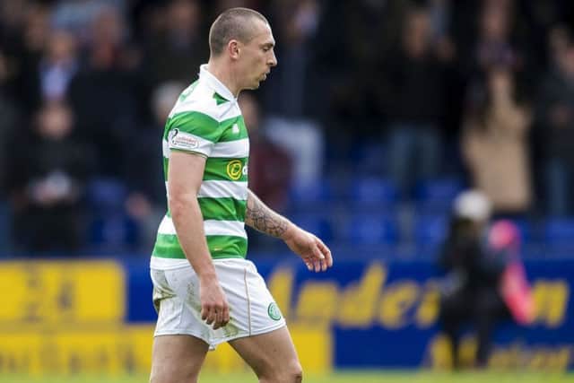 Celtic's Scott Brown leaves the field after being shown a red card. Picture: SNS.